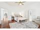 Bright bedroom with an open bathroom and walk-in closet at 6437 N Oxbow Way, Indianapolis, IN 46220