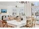 Open floor plan with a dining room flowing into the living room at 6437 N Oxbow Way, Indianapolis, IN 46220
