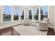 Inviting sunroom with comfortable seating, large windows, and a cozy atmosphere at 6777 Pulaski Ct, Carmel, IN 46033