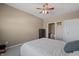 Bright bedroom with ceiling fan and access to a full bath at 7710 Silver Moon Way, Indianapolis, IN 46259