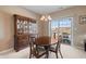 Dining room with hutch, table and chairs, and patio access at 7710 Silver Moon Way, Indianapolis, IN 46259