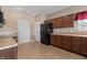 Well-equipped kitchen featuring ample cabinetry and black appliances at 7710 Silver Moon Way, Indianapolis, IN 46259