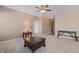Bright living room with carpeted floors and neutral decor at 7710 Silver Moon Way, Indianapolis, IN 46259