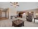 Open living room with hardwood floors and comfortable seating at 7710 Silver Moon Way, Indianapolis, IN 46259