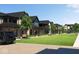 Row of new townhouses with ample green space and parking at 9891 Sunbranch Dr, Carmel, IN 46290