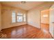 Spacious living room featuring hardwood floors and ample natural light at 1014 N Sheffield Ave, Indianapolis, IN 46222