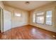 Bright living room with hardwood floors and large windows at 1014 N Sheffield Ave, Indianapolis, IN 46222