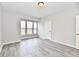 Well-lit bedroom with bay windows and wood-look floors at 11722 Platt St, Noblesville, IN 46060