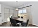 Dining area with table and chairs near sliding glass doors and view at 11722 Platt St, Noblesville, IN 46060