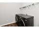 Laundry room with LG washer and dryer and shelving at 11722 Platt St, Noblesville, IN 46060