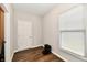 Simple office space with wood-look floors and a window at 11722 Platt St, Noblesville, IN 46060