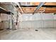 Unfinished basement with exposed beams and plumbing at 11722 Platt St, Noblesville, IN 46060