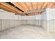 Unfinished basement with exposed beams and plumbing at 11722 Platt St, Noblesville, IN 46060