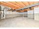 Unfinished basement with exposed beams and plumbing at 11722 Platt St, Noblesville, IN 46060