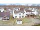 Aerial view of a fenced backyard featuring green grass and a storage shed at 1229 Tealpoint Cir, Indianapolis, IN 46229