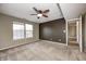 Bedroom featuring two windows for natural light and neutral-colored walls at 1229 Tealpoint Cir, Indianapolis, IN 46229