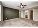 Large bedroom has a closet, ceiling fan, and is carpeted in neutral at 1229 Tealpoint Cir, Indianapolis, IN 46229