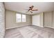 Bedroom featuring a ceiling fan, large closet, and a window at 1229 Tealpoint Cir, Indianapolis, IN 46229