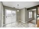Cozy dining area featuring sliding glass doors that offer views of the outside at 1229 Tealpoint Cir, Indianapolis, IN 46229