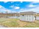 A shed near a water source with clouded skies at 1229 Tealpoint Cir, Indianapolis, IN 46229