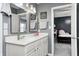 Stylish bathroom featuring dual sinks, modern fixtures, and clean white cabinets at 1295 Longleaf St, Avon, IN 46123