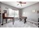 A versatile bedroom with a foosball table, and neutral carpet, perfect for work and play at 1295 Longleaf St, Avon, IN 46123