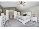 Comfortable main bedroom featuring vaulted ceilings, plush carpet, and ensuite bathroom with ample closet space at 1295 Longleaf St, Avon, IN 46123