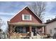 Charming two-story home with a welcoming front porch and beautifully maintained lawn at 1341 N Dearborn St, Indianapolis, IN 46201