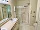 Standard bathroom with shower-tub combo and sliding glass door at 1348 Mccormicks Cir, Danville, IN 46122