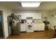 Well-equipped kitchen with white cabinets, modern appliances, and ample storage space for cooking essentials at 1348 Mccormicks Cir, Danville, IN 46122