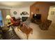 Spacious living room with fireplace, ample seating and natural light at 1348 Mccormicks Cir, Danville, IN 46122