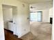 Inviting living room open to kitchen offering ample space for entertaining and relaxation at 1348 Mccormicks Cir, Danville, IN 46122