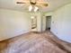 Spacious main bedroom provides ample space and doorway access to the ensuite bathroom at 1348 Mccormicks Cir, Danville, IN 46122