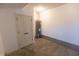 Unfinished basement with water heater and concrete floor at 1523 Marlowe Ave, Indianapolis, IN 46201