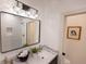 Modern bathroom with double vanity and geometric tile shower at 1523 Marlowe Ave, Indianapolis, IN 46201