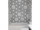 Stylish bathroom featuring hexagonal marble tile and gold fixtures at 1523 Marlowe Ave, Indianapolis, IN 46201