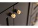 Close-up of dark vanity with gold knobs at 1523 Marlowe Ave, Indianapolis, IN 46201