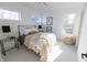 Bright bedroom with a queen bed, ample natural light, and stylish decor at 1523 Marlowe Ave, Indianapolis, IN 46201