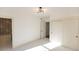 Simple bedroom with white walls, carpet, and sliding door closet at 1523 Marlowe Ave, Indianapolis, IN 46201