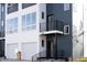 Modern two-story home with balcony and attached garage at 1523 Marlowe Ave, Indianapolis, IN 46201