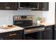 Modern kitchen with stainless steel range and microwave at 1523 Marlowe Ave, Indianapolis, IN 46201