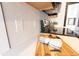 Modern kitchen with stainless steel range and white herringbone backsplash at 1523 Marlowe Ave, Indianapolis, IN 46201