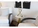 Stylish living room features two comfy armchairs and an elegant side table at 1523 Marlowe Ave, Indianapolis, IN 46201