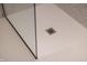 Close-up view of a modern shower drain in a newly renovated bathroom at 1523 Marlowe Ave, Indianapolis, IN 46201