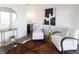 Stylish sitting area with two white armchairs and a cowhide rug at 1523 Marlowe Ave, Indianapolis, IN 46201
