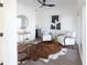 Cozy sitting area featuring a bar cart, comfy chairs, and a stylish rug at 1523 Marlowe Ave, Indianapolis, IN 46201
