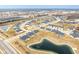Aerial view of neighborhood with pond and road at 16930 Cole Evans Dr, Noblesville, IN 46060