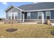 Newly built home with a backyard patio at 16930 Cole Evans Dr, Noblesville, IN 46060