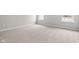 Empty bedroom with neutral-toned carpet and large windows at 16930 Cole Evans Dr, Noblesville, IN 46060