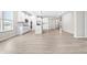 Open concept kitchen with white cabinets and island at 16930 Cole Evans Dr, Noblesville, IN 46060